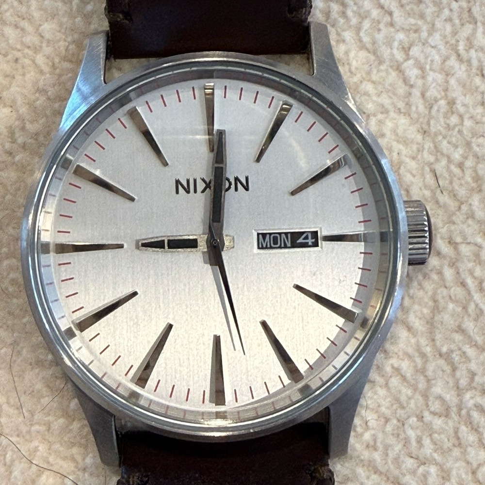 Nixon The Sentry Men's Watch Silver Dial Brown Leather Day Date 100M Quartz